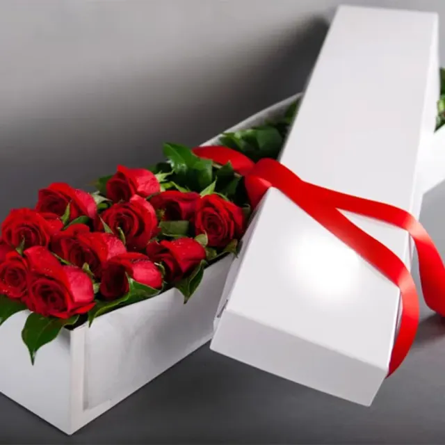 Red roses in the box - dozen