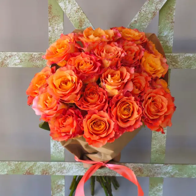 25 roses wrapped in paper