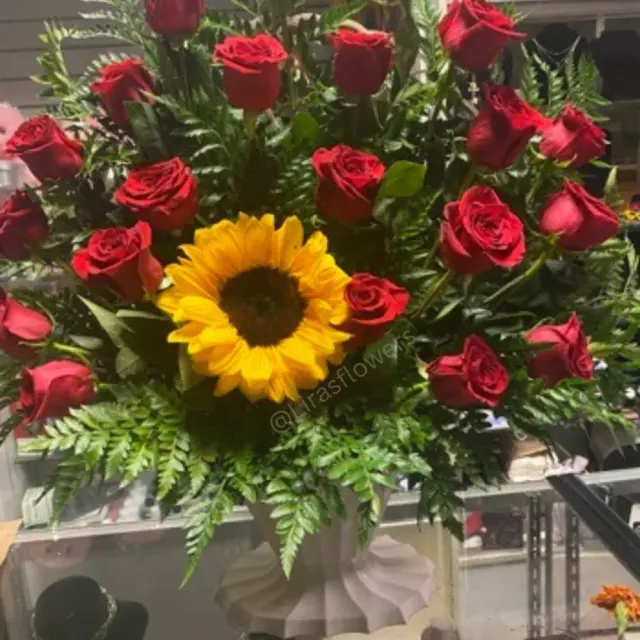 A sunflower & roses