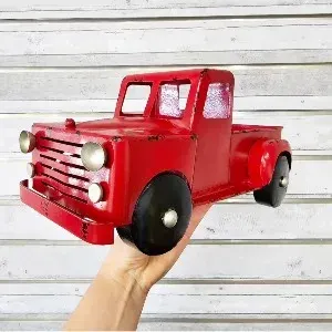 Plant Or Arrangement in Red Truck