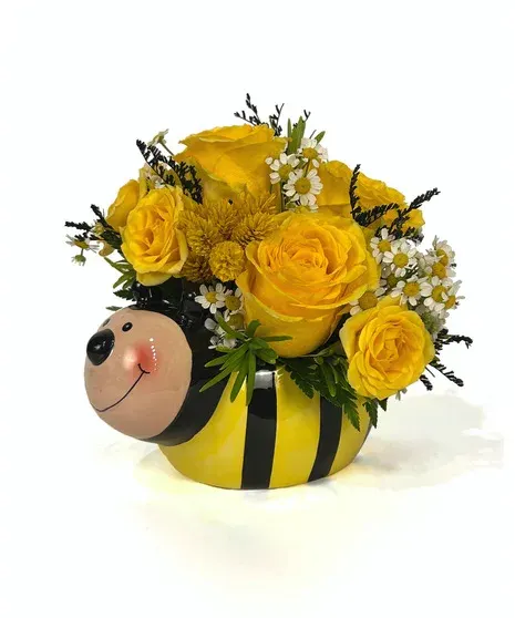 The Pollinator Bright Yellow Bee Arrangement