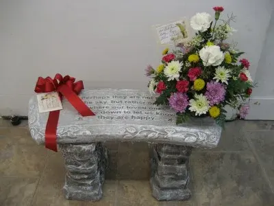 Memorial Bench With Fresh Flowers